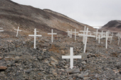 Grave markers and flowers in the cemetery at Scoresbysund, an Inuit village in East Greenland. 2005