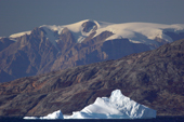Dramatic Mountains and icecap in Hall Bredning. Scoresbysund Fiord. East Greenland. 2005