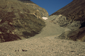 Walkers head up to a valley glacier at Eleonora Bay, famous for its 16km deep sedimentary layers. Kejser Franz Joseph Fiord. North-east Greenland National Park. 2005