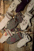 Woolen mittens hanging in a craft shop in Jukkasjarvi. Sweden. 2003
