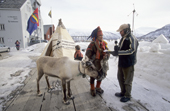Sami reindeer herder, Ole Mathis Oskal, being interviewed at a demonstration about injustice, with his reindeer in Tromso. Norway. 2000