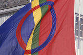 The Sami Flag blowing in the wind. Norway. 2000