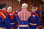 Sami youths play around at their confirmation. Koftes from Kautokeino (center) and Karasjok. Sapmi. N. Norway. 2000