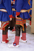 Sami youths in Kofte with decorated wings worn over reindeer skin leggings. Karasjok. Sapmi. N.Norway. 2000