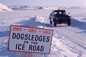 Sign warning of dog sleds, on ice road between Thule Air Base and Dundas. Northwest Greenland. 1980