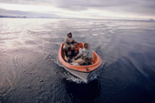 Jens Danielsen and Tukak Kristiansen (front),Inuit hunters, return from an autumn seal hunt by boat. Moriussaq. Thule, Northwest Greenland. (1987)