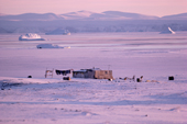 Inuit home on a raised beach above the coast, at freeze-up. Moriussaq. North West Greenland. 1987