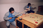 Inuit youths at the youth club, where they can play games or musical instruments Moriussaq. NW Greenland. 1987