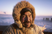 Ituko, an Inuit hunter, out seal hunting on sea ice. Northwest Greenland. 1987