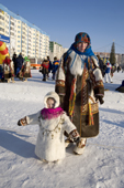 A Khanty woman & child at a reindeer herder's festival in Nadym. Yamal, NW Siberia, Russia