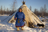 Sergey Serotetto, a Nenets reindeer herder, standing outside his tent. Yamal, NW Siberia, Russia