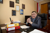 Alexandre Serotetto, the director of the Yarsalinsky State Farm, in his office in the village of Yar-Sale. Yamal, NW Siberia, Russia