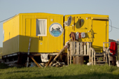 A brightly painted metal balok (hut) used by a Nenets family at a fishing camp by the Yuribey River. Gyda, Tazovsky Region, Gydan Peninsula, Yamal, Russia