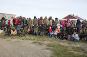 Nenets fishermen and their families listen to speeches by officials during the 'Fisherman's Holiday' celebrations on the Yuribey River. Gyda, Tazovsky region, Yamal, Siberia, Russia