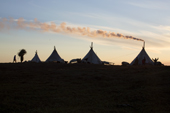 A Nenets reindeer herders summer camp at sunset on the tundra near Cup Lake. Gyda, Tazovsky Region, Yamal, Siberia, Russia