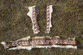 A traditional Nenets design,of inlaid fur sewn onto the leg skins of reindeer. It will be used as decoration on a traditional Yakushka (woman's reindeer skin coat). Gyda, Tazovsky region, Yamal, Siberia, Russia