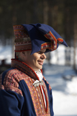 Portrait of Sami man dressed in traditional national Costume. Yllas, Lapland, Finland.