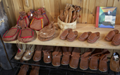 Leather bags and shoes, sold as souvenirs. Lapland, Sweden.