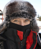 Woman wearing a fur hat and protective clothing against the extreme cold. Laino, Lapland, Finland. MR