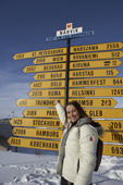 Female Tourist with International Signs, Narvik, Lapland, Norway