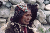 Woman Yak herder wears a head-dress of turquoise and other semi-precious stones. Nimaling Plateau. Ladakh. India.